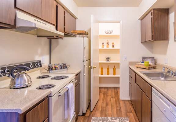 The Springs kitchen view with spacious pantry for food storage