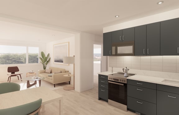 A modern kitchen with dark grey cabinets and a white countertop.