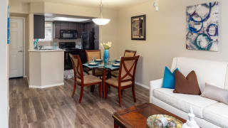 La reserve view of spacious kitchen with plenty of cabinetry with dining area near
