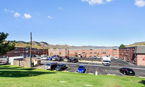 Parking lot view at Golden Arms Apartments, Golden