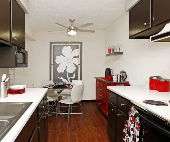 kitchen and dining room at the district flats apartments in lenexa