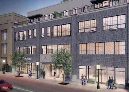 A rendering of a street with a red car and a building with a sign that says "Morgan".