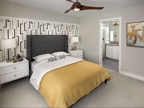 a bedroom with a bed and a ceiling fan at Novella Arcadia, Phoenix, 85018