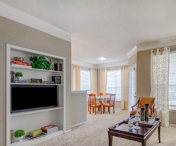 a living room with a couch and a television