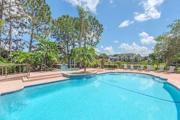 Park Del Mar Apartments resort-style pool with waterfall and spa