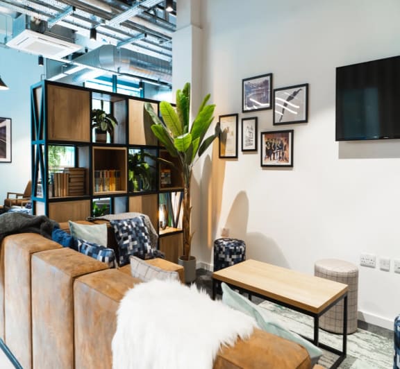 a living room with a couch and a table