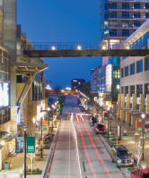 Aerial shot from above the street of the Shops at Park Lane in Dallas, TX at dusk