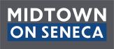 a blue and white sign that reads midtown on seneca