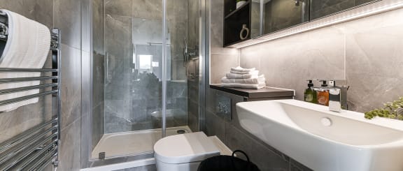 a bathroom with a sink toilet and a tub