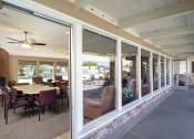 Thumbnail 17 of 33 - community clubhouse outside shade area