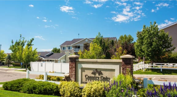 a subdivision sign in front of a house