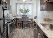 Thumbnail 16 of 46 - Contemporary Cooking Space at Countryside Estates Apartments, Minnesota