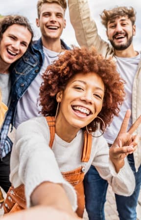 a group of people smiling and posing for a picture at The Park Apartments in Minneapolis, MN