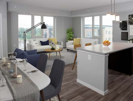 an open floor plan with a kitchen and living room