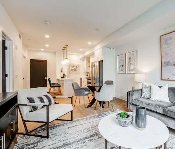 a living room with a couch and a table at Rialto, Washington District of Columbia