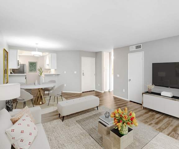 a living room with a couch and a tv