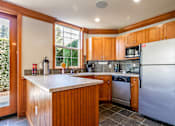 Thumbnail 3 of 17 - Kitchen with stainless steel appliances - Springbrook Apartments
