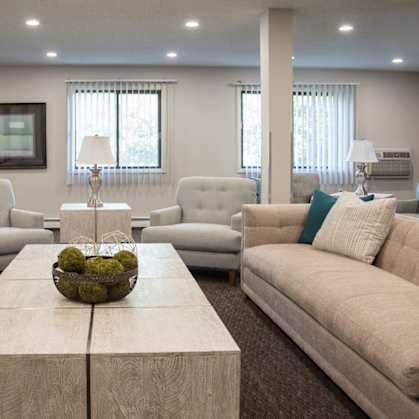 a living room with couches and a coffee table