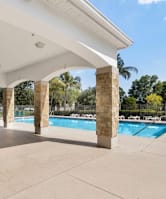 Pool side covered Patio at Mer Soleil Apartments, Naples, FL