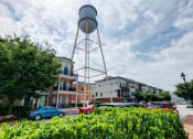 Thumbnail 27 of 35 - a city street with a water tower in the middle of it at East 51 At Rocketts Landing, Richmond, 23231