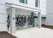 Thumbnail 29 of 35 - a group of bikes parked in front of a building at East 51 At Rocketts Landing, Richmond, 23231