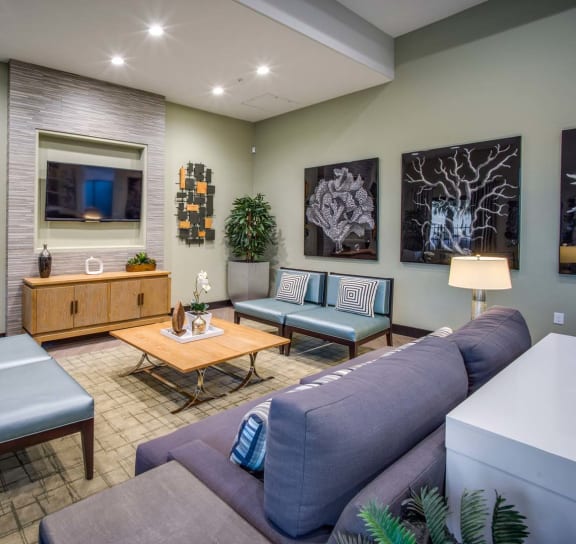 a living room with couches and a coffee table