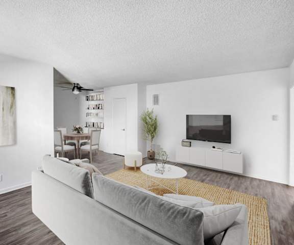 a living room with a couch and a tv