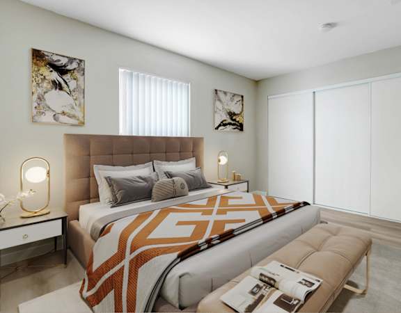 a bedroom with a bed and a large window