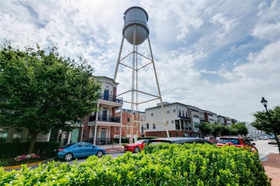 a city street with a water tower in the middle of it at East 51 At Rocketts Landing, Richmond, 23231