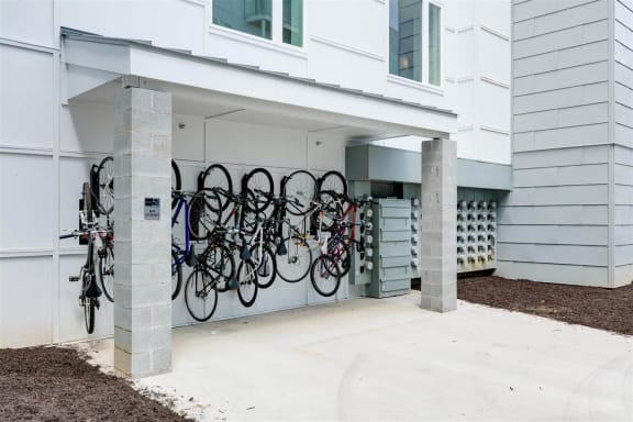 a group of bikes parked in front of a building at East 51 At Rocketts Landing, Richmond, 23231