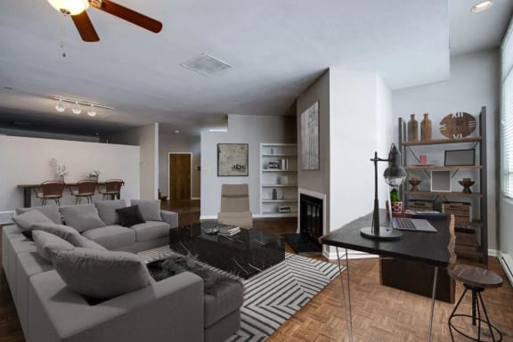 a living room with a couch and a table  at Metro67, Memphis, TN, 38103