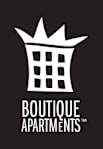 A black and white image of a building with the words "Boutique Apartments" written underneath it.