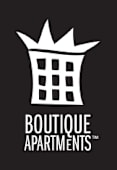 A black and white image of a building with the words "Boutique Apartments" written underneath it.