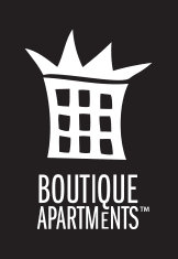 A black and white image of a building with the words "Boutique Apartments" written underneath it.