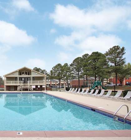 the swimming pool at the resort on a sunny day