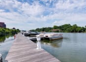 Thumbnail 34 of 35 - a row of boats docked at a dock at East 51 At Rocketts Landing, Richmond, 23231