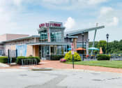 Thumbnail 14 of 35 - a restaurant with a sign on the front of it at East 51 At Rocketts Landing, Richmond, 23231