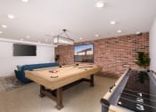 Thumbnail 28 of 50 - Community lounge featuring a TV viewing area