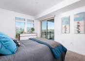 Thumbnail 22 of 50 - Window treatments include horizontal blinds and roller shades