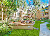 Thumbnail 25 of 33 - Resort-like picnic and barbecue area, lush landscaping