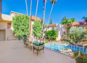 Thumbnail 23 of 33 - Spacious patio with swimming pool view