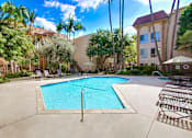 Thumbnail 19 of 33 - Resort-style courtyard swimming pool, lounge and picnic area on the sides