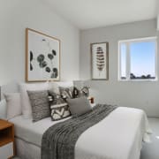a bedroom with a large bed in a room