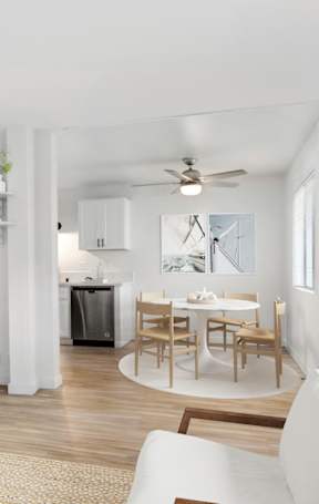 a living room with a dining room and a kitchen