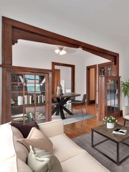 a living room with a couch and a coffee table at The Park Apartments in Minneapolis, MN