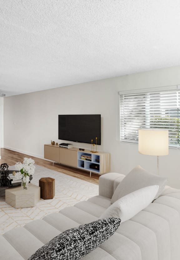 a living room with a couch and a table
