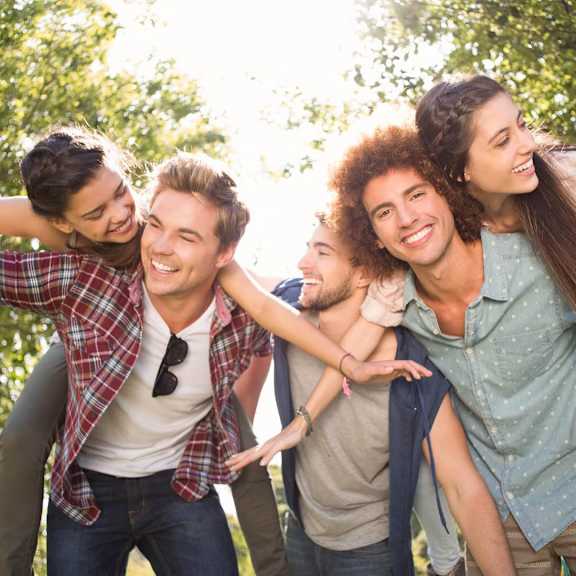 group of friends posing for a picture together