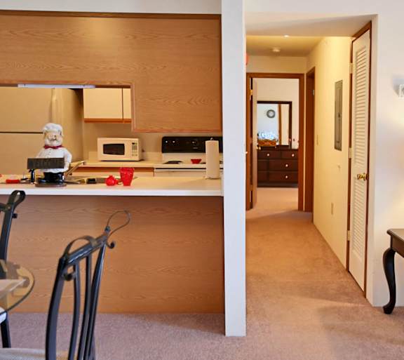 a living room with a couch and a table and a television