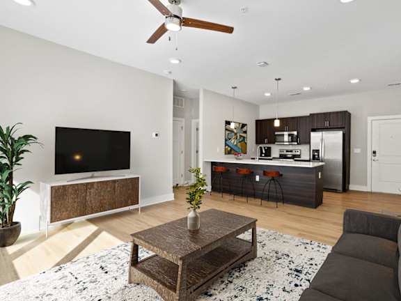 a living room with a couch and a table