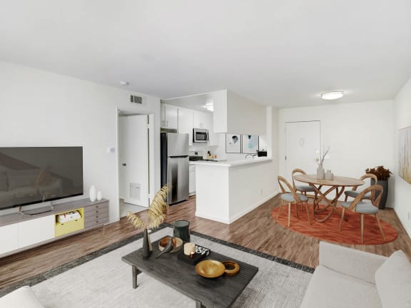 a living room with a couch and a table and a television